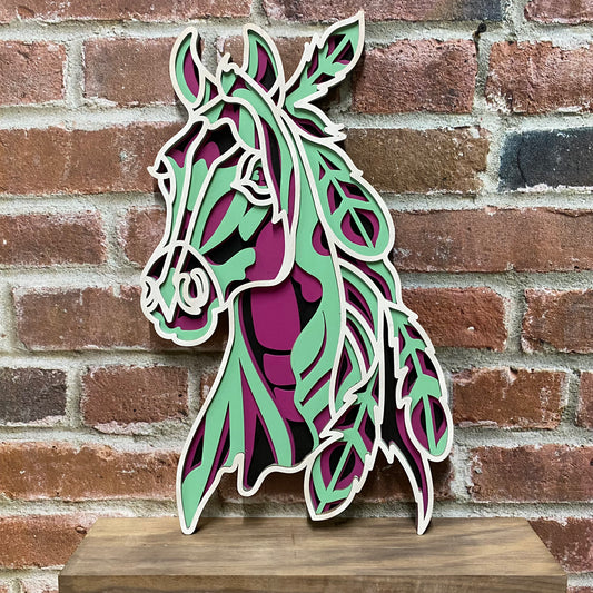 Layered horse head with feathers